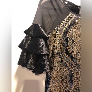 Black and gold midi dress with ruffle sleeves